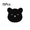 A black, fuzzy cat-shaped pet hair remover sponge.