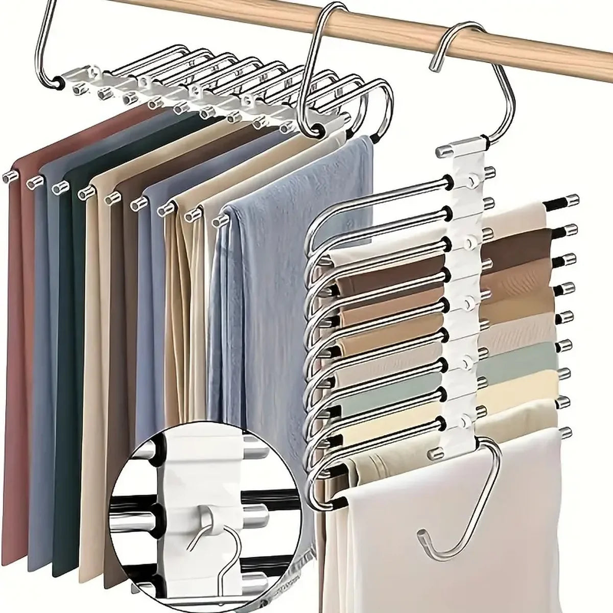 Stainless steel multi-layer hangers holding various colored garments on a wooden rack.