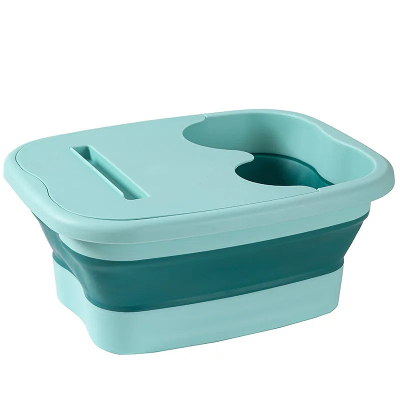 A teal foldable foot soak bucket with a contoured basin and lid.