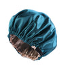 A teal satin sleep cap with a gathered brim, shown from the side.