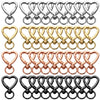 A set of heart-shaped spring hook keychains in silver, gold, rose gold, and black finishes.