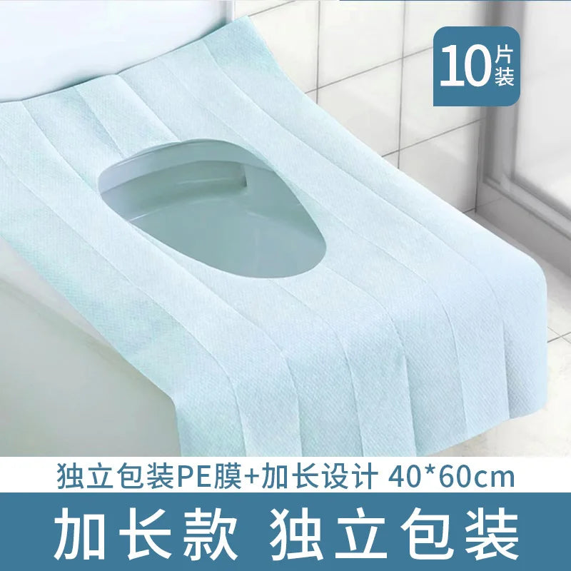 Light blue disposable seat covers with a molded design for printing, shown in a flat lay view.
