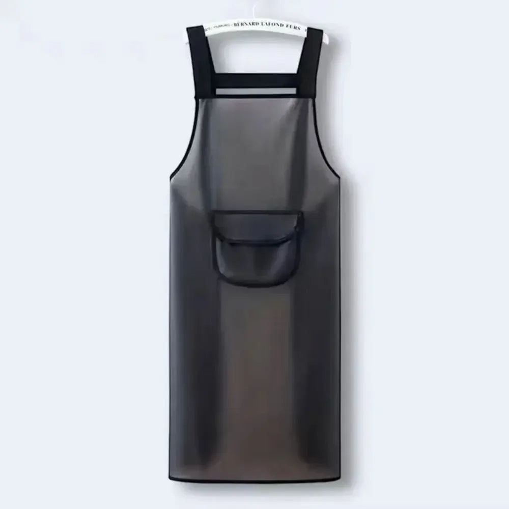 A black waterproof transparent kitchen apron hanging against a white background.