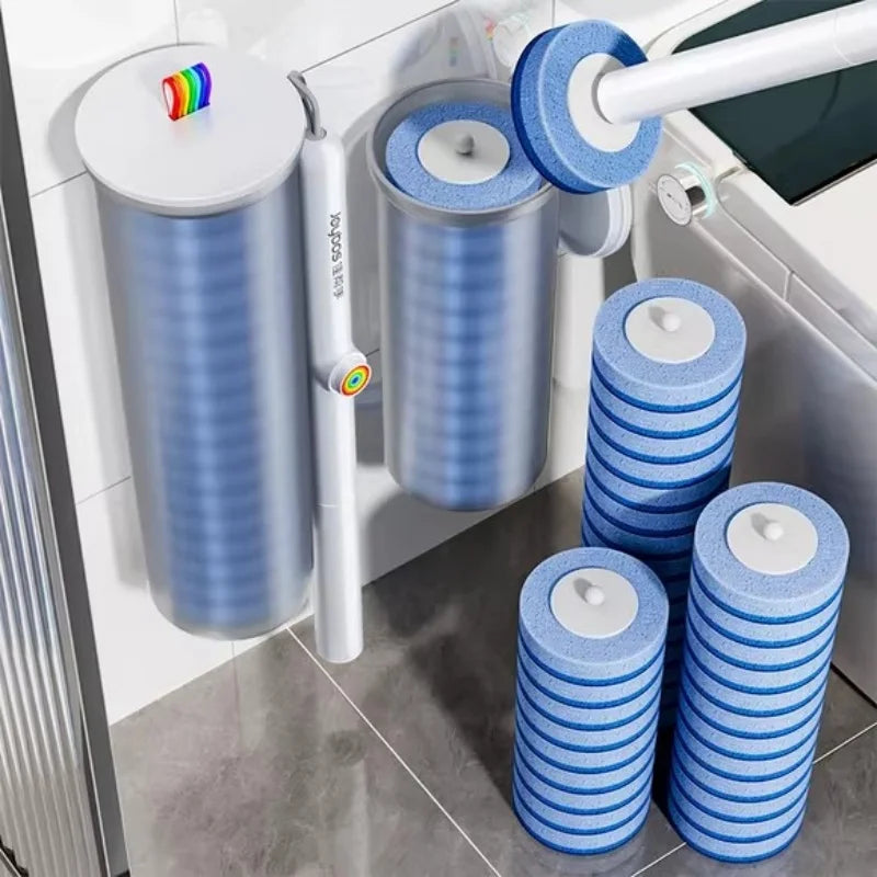 A disposable toilet brush cleaning kit with blue and white bristles and a white handle is shown next to a toilet.