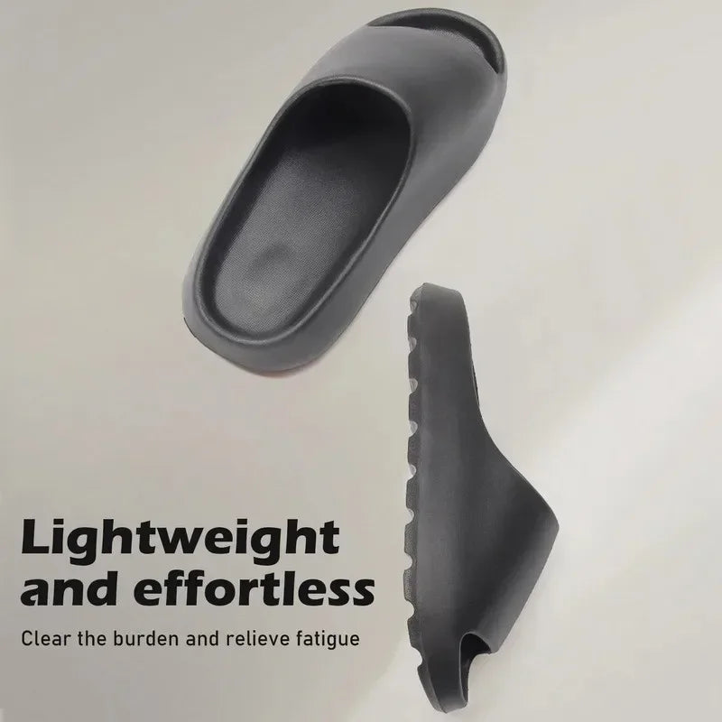A black lightweight and effortless slide product shown from above and the side.