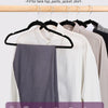 A set of multipurpose hangers with chrome hooks shown hanging on a wooden rod, featuring various clothing items like jackets,