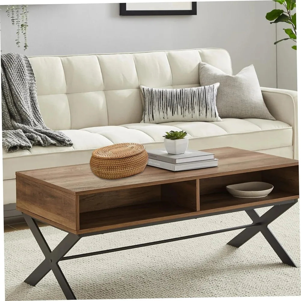 A wooden storage bench with a rattan basket on top and a neutral upholstered sofa in a bright living room.
