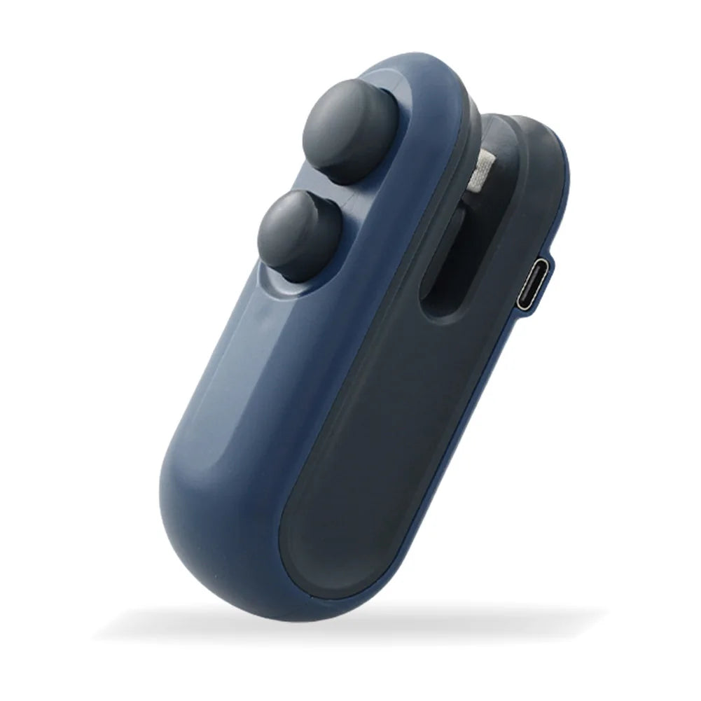 A dark blue handheld device with three round buttons and a slot for a blade, used as a bag sealer and cutter.