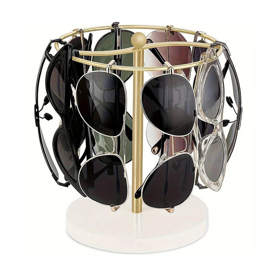 An elegant glasses organizer stand with a gold-toned metal frame and wooden base holding various sunglasses.