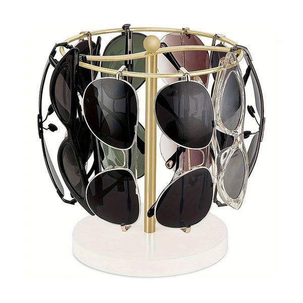 An elegant glasses organizer stand with a gold-toned metal frame and wooden base holding various sunglasses.