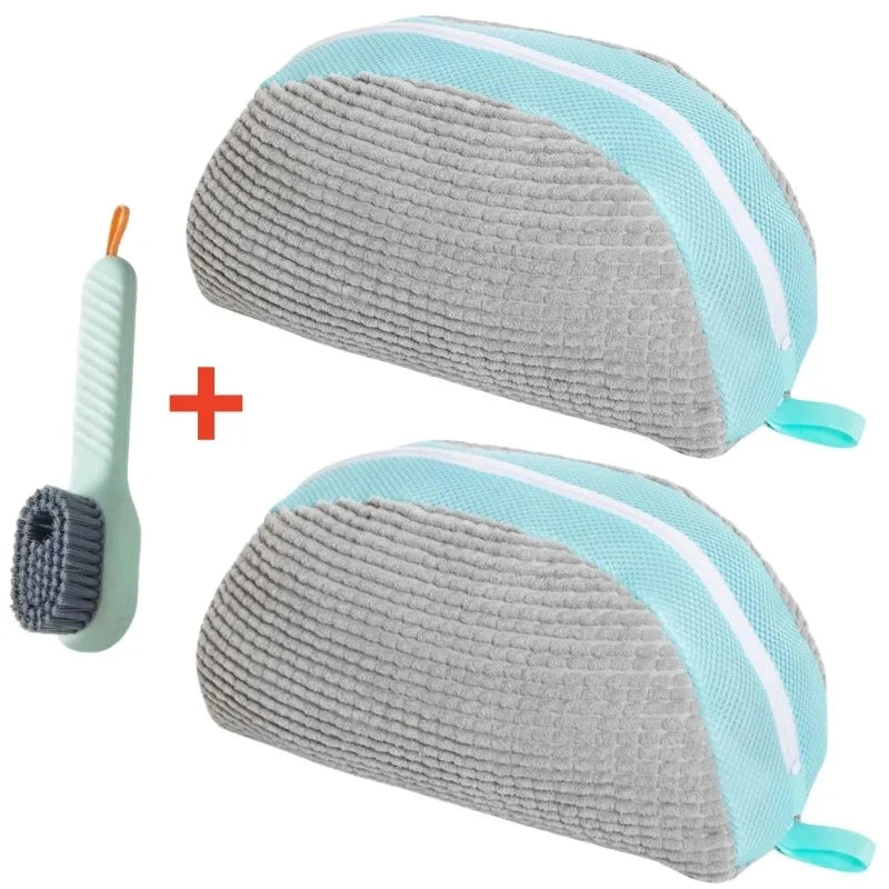 A gray and light blue multi-use shoe cleaning set with brushes and a storage bag.
