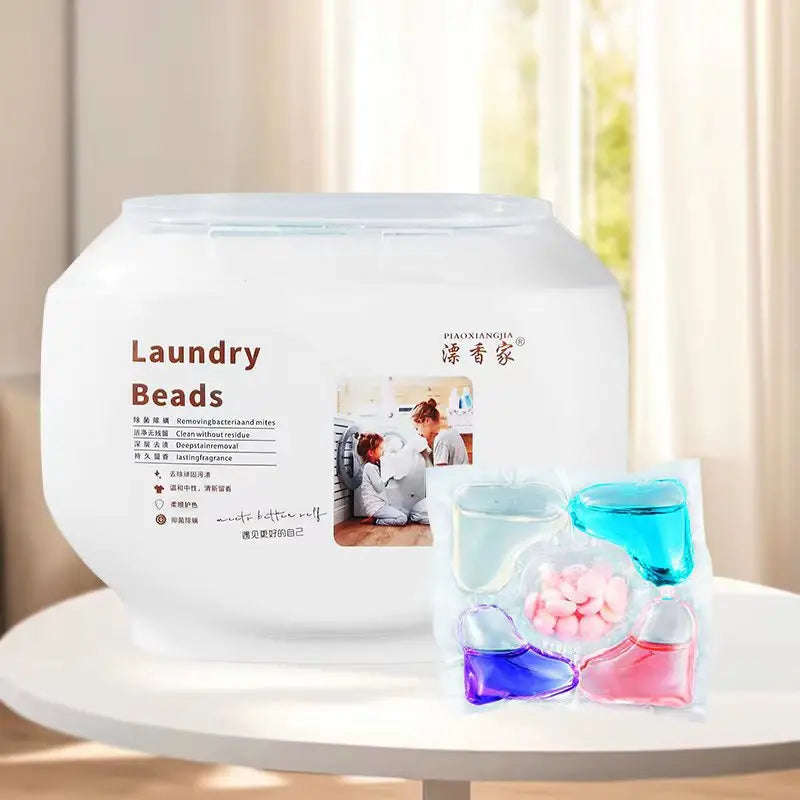 A white plastic bottle of Laundry Beads with a clear liquid and a package containing several small glass bottles of the produ