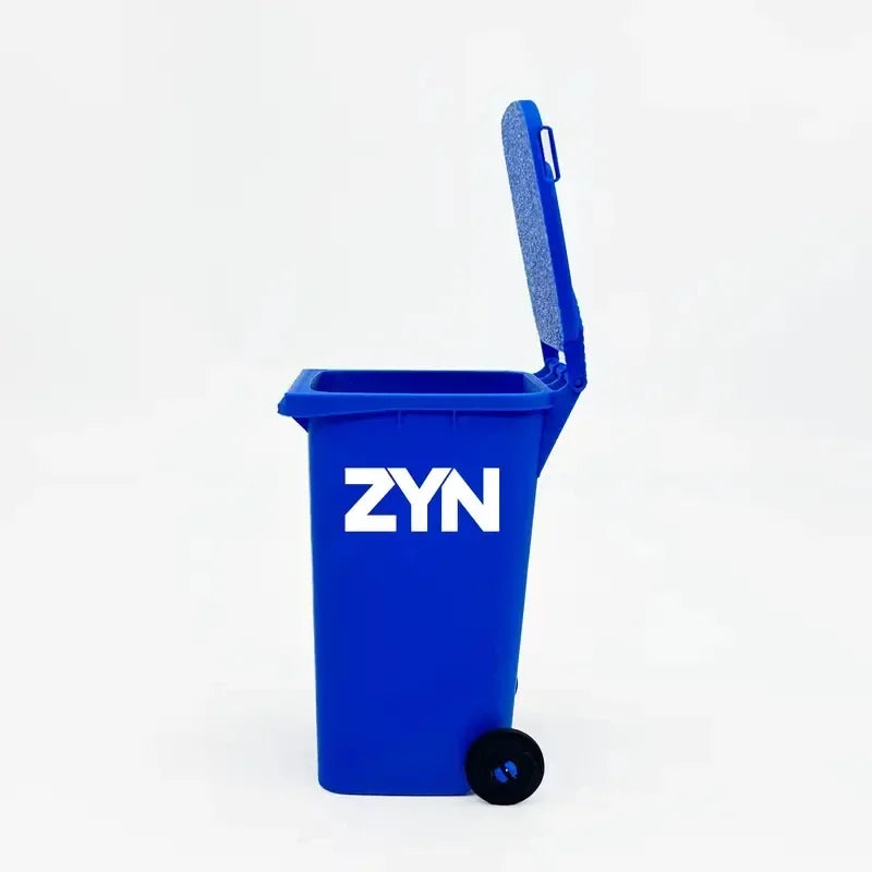 A blue mini desk organizer trash can with a hinged lid and wheels, featuring the ZYN logo.