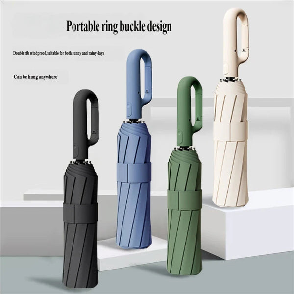 Three portable ring buckle design umbrellas in black, blue, and green colors shown standing upright.