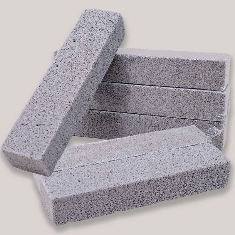 Stack of gray natural pumice stone cleaning sticks
