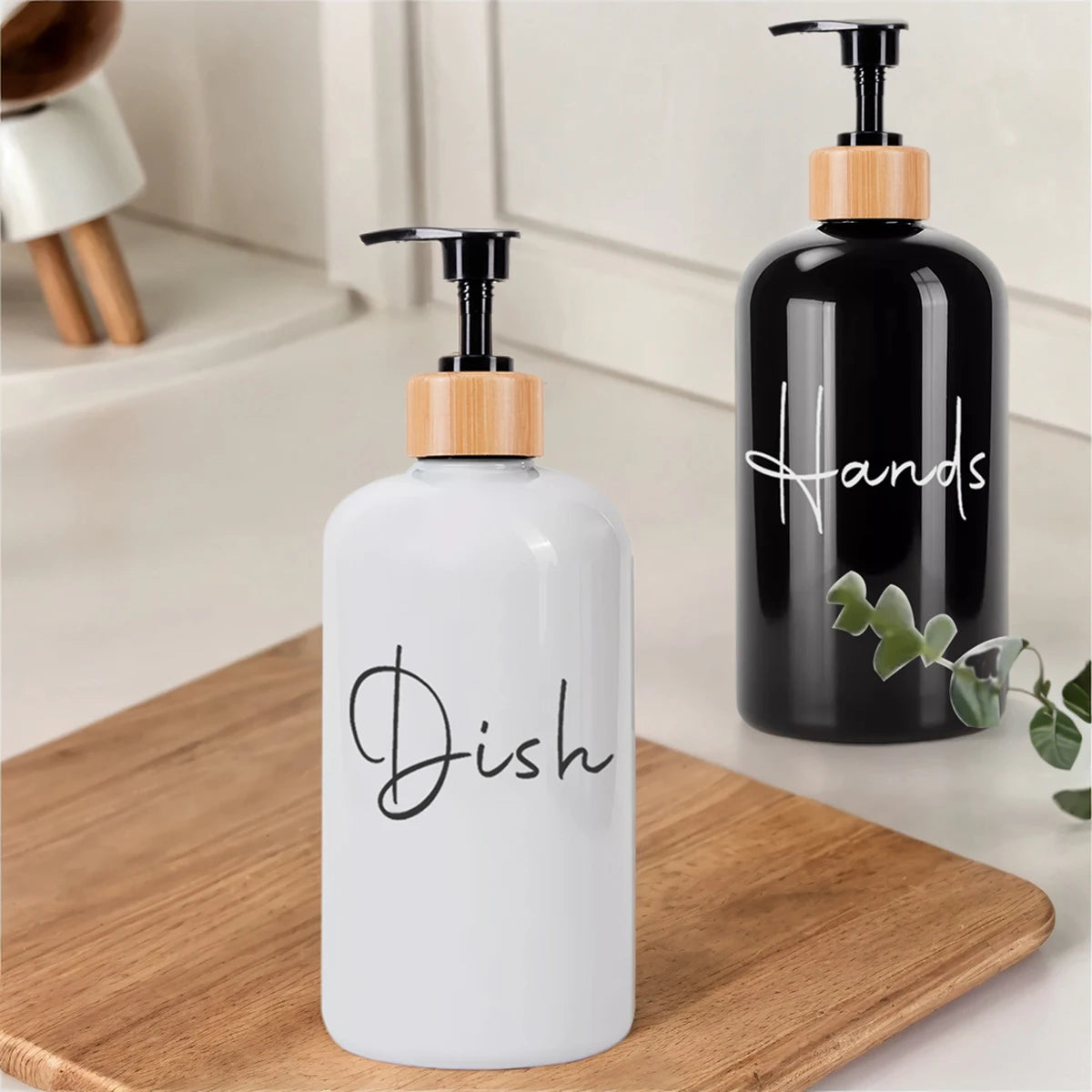 A white hand soap dispenser bottle with a wooden pump and black liquid on a wooden surface.