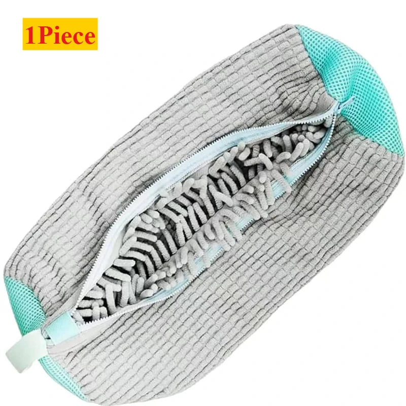 A single gray shoe cleaning cloth with a mesh lining and a teal trim is shown.
