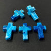 Three light blue to deep blue cross pendant charms made of natural agate and jasper