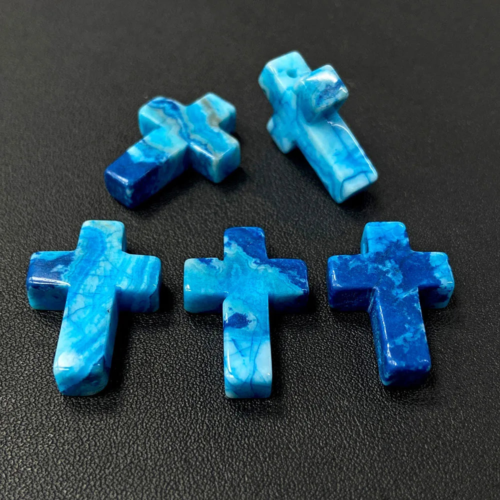 Three light blue to deep blue cross pendant charms made of natural agate and jasper