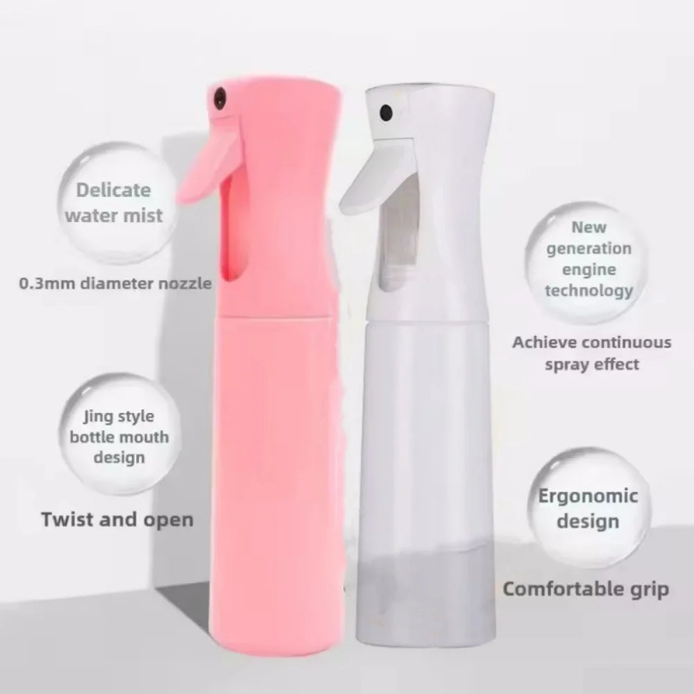 Pink and white refillable mist spray bottles with a delicate nozzle design and ergonomic grip