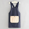 Navy striped waterproof sleeveless kitchen apron with a removable beige hand towel