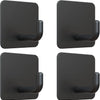 Two dark gray adhesive hooks for organization, shown in different angles.