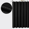 Black waterproof solid color shower curtain hanging from a rod