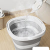 A white foldable plastic bucket with an arc handle is shown pouring water into a basin, demonstrating resistance to high temp