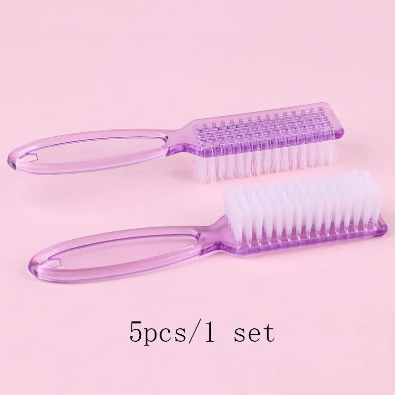 A set of five purple plastic brushes for nail art and dust cleaning displayed on a pink background.