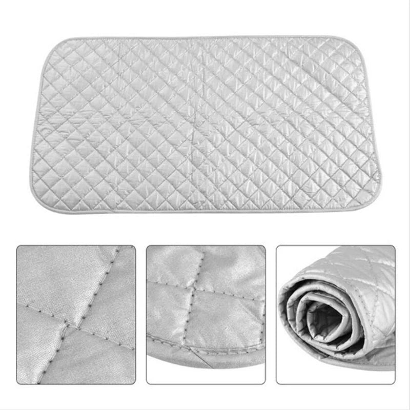 A gray quilted folding ironing mat shown in various views including a flat surface and rolled up.