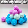 A pile of reusable magic laundry balls in various shades of pink and blue.