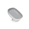 A white suction cup soap dish with built-in drainage.