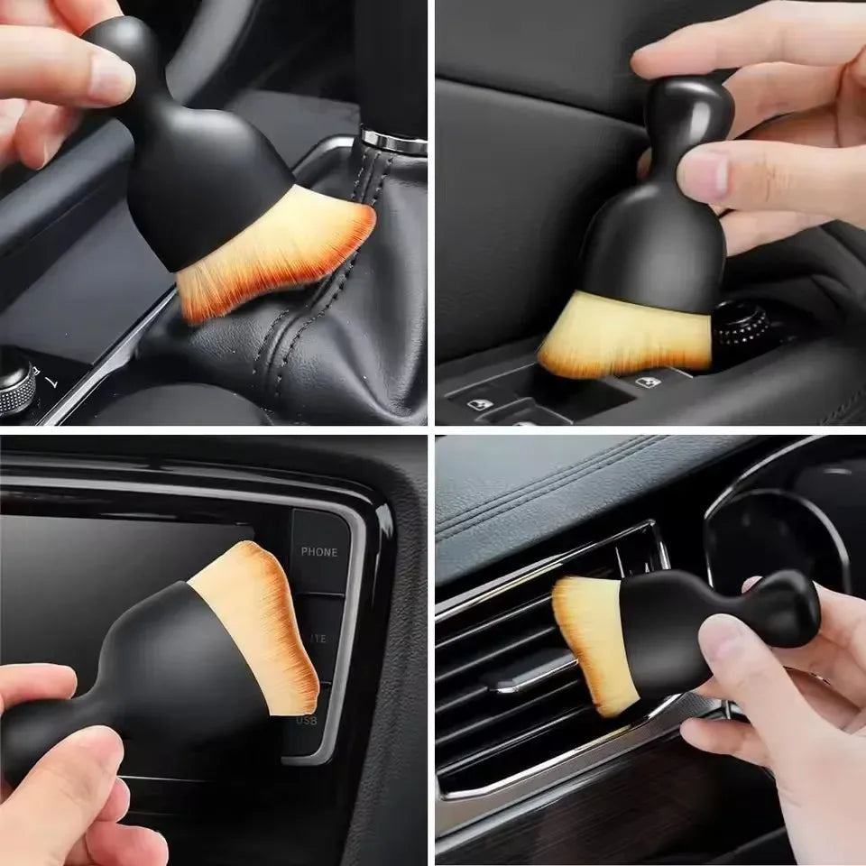 A set of black cleaning brushes with light wood accents shown in various angles for multi-surface cleaning.
