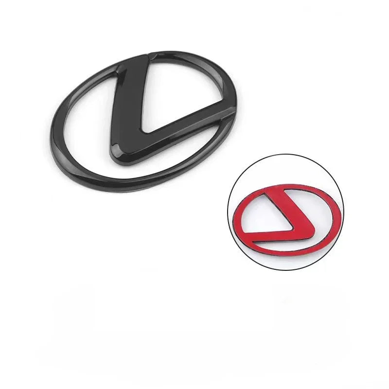 A black, oval-shaped logo replacement paste for a 3D steering wheel.
