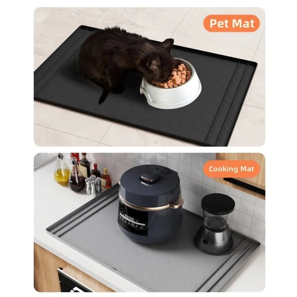 A black silicone mat is shown with a cat eating on it, and a gray silicone cooking mat is shown with a pot on it.