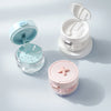 A collection of portable multi-tool organizers for dental appliances in light blue and pink colors.