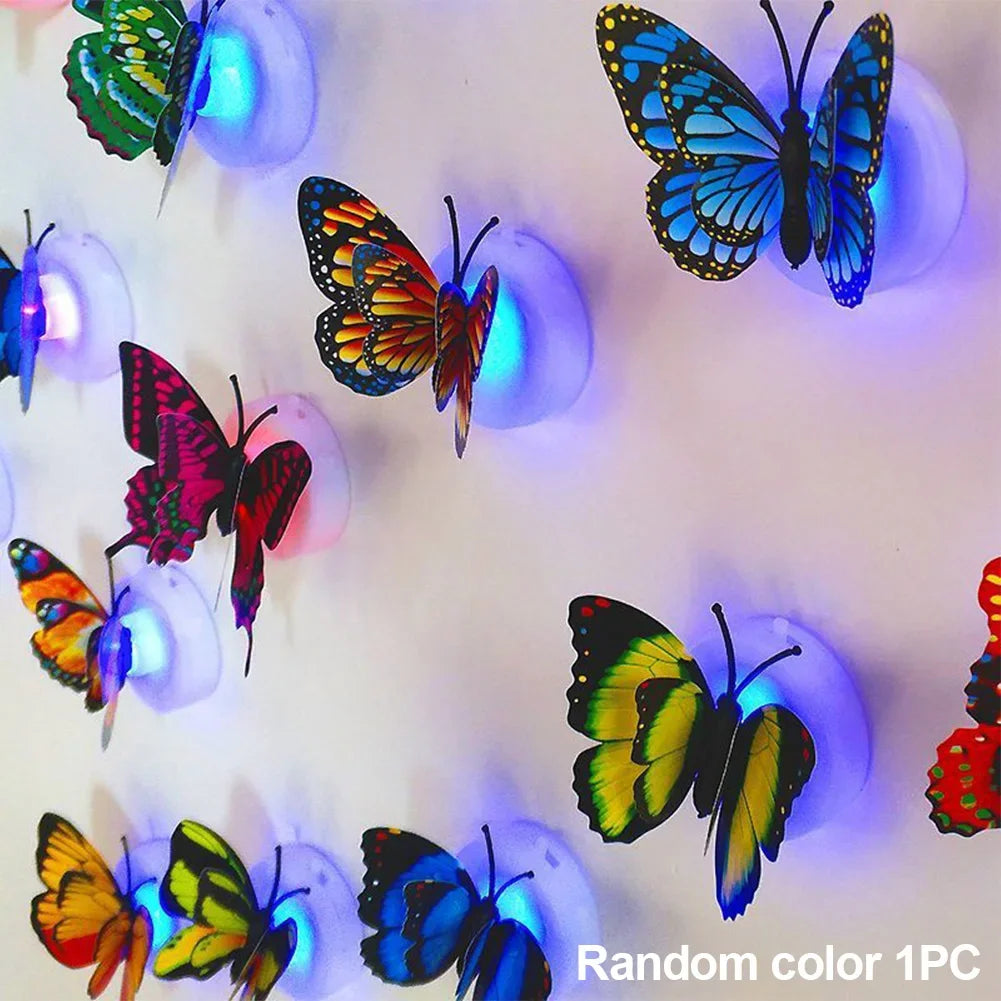 A collection of luminous 3D butterfly wall lights in various colors, including blue, orange, and green.
