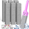 A set of gray natural pumice cleaning sticks for limescale removal, shown alongside a pink cleaning tool.