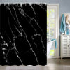 Black marble abstract fluid texture shower curtain hanging in a bathroom