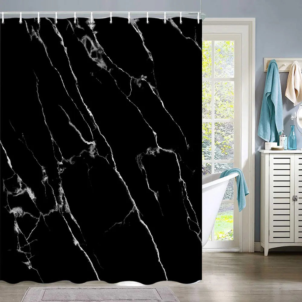 Black marble abstract fluid texture shower curtain hanging in a bathroom