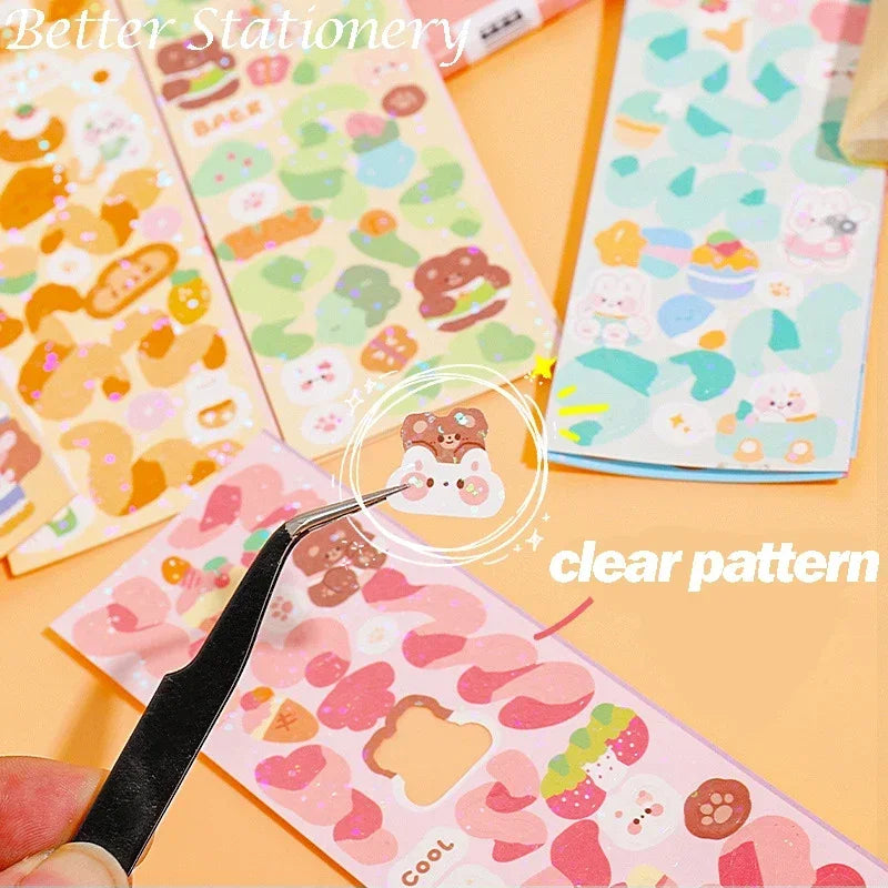 A hand uses a tool to show a clear pattern on a pink and green kawaii DIY sticker pack for crafting.