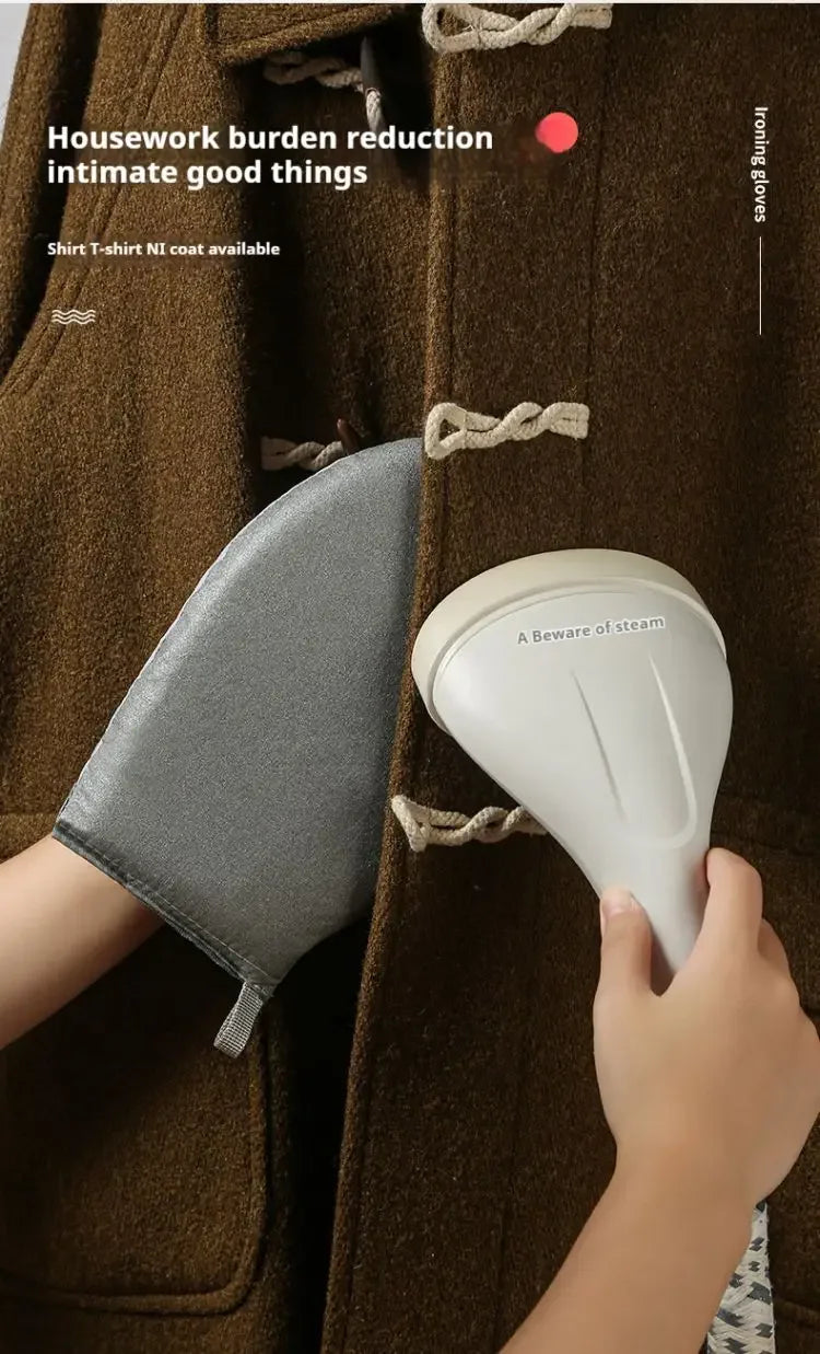 A pair of white handheld ironing gloves being used on a dark brown coat.