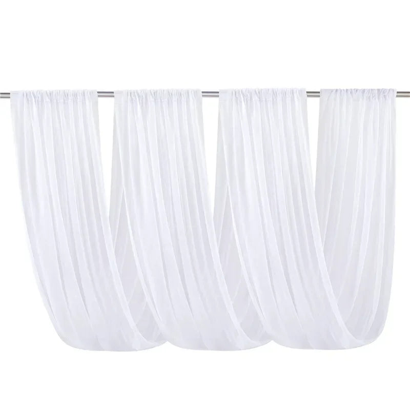 White sheer chiffon draping fabric suspended from a metal rod for ceiling decoration