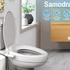 A white toilet with a mounted bidet attachment and surrounding features for an Ultra-Slim Dual Nozzle Bidet Attachment.